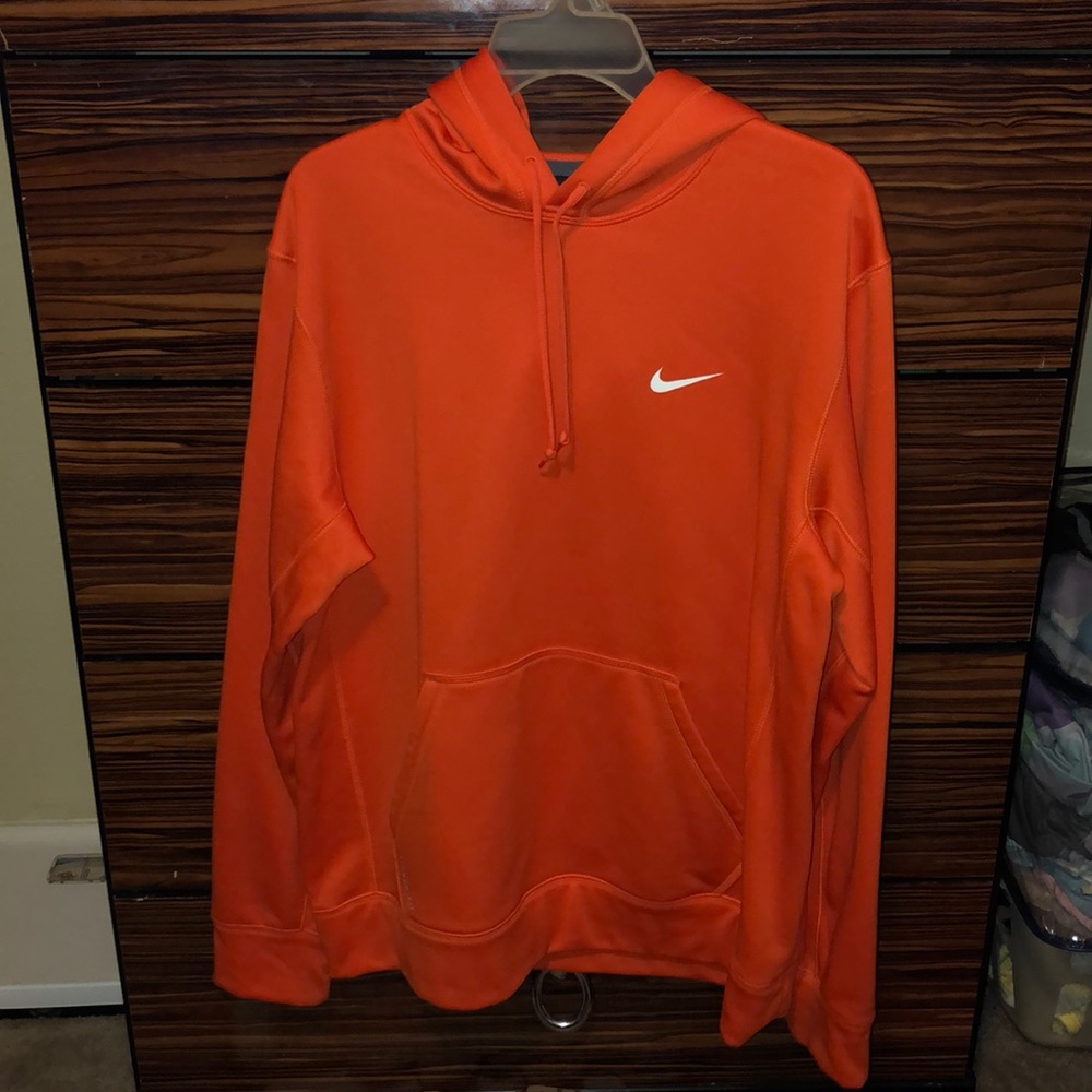 orange nike pull over